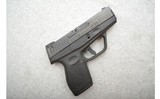Taurus ~ PT709 Slim ~ 9mm - 1 of 4
