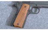 Springfield 1911-A1
45 Auto - 2 of 4
