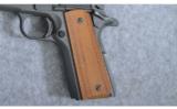Springfield 1911-A1
45 Auto - 4 of 4
