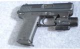 H&K ~ USP Compact ~ .40 S&W - 1 of 4