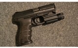 HK ~ P30 ~ 9mm Luger - 1 of 3