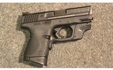 Smith & Wesson ~ M&P 9c ~ 9mm Luger - 1 of 2