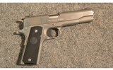 Colt ~ 1911 ~ .45 Auto - 1 of 3