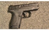 Smith & Wesson ~ M&P9 Shield ~ 9mm Luger - 1 of 3