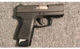 Kahr Arms ~ PM9 ~ 9mm Luger - 1 of 2