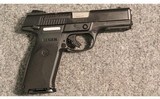 Ruger ~ SR9 ~ 9mm Luger - 1 of 2