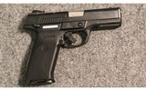 Ruger ~ SR9 ~ 9mm Luger - 1 of 2