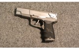 Ruger ~ P90 ~ .45 Auto - 2 of 2