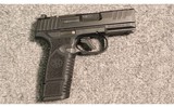 FN ~ Reflex ~ 9mm Luger - 1 of 2