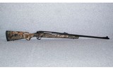 Remington~700~.338 Winchester magnum - 1 of 8