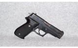 Sig Sauer~P220~45 Auto - 1 of 2