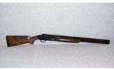 Benelli~828U~12 Gauge - 1 of 7