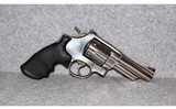 Smith & Wesson~Model 629-6 Stainless~.44 Magnum 4" Barrel with Case - 1 of 3