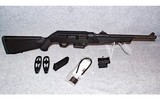 Ruger~pc carbine~9mm luger - 13 of 13