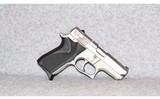 Smith & Wesson~Model 6906 Stainless Mini~9mm Luger 3.5" Barrel - 1 of 3