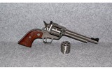 Ruger~New Model Single Six Stainless~.22 LR & .22 Magnum - 1 of 3