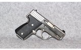 KAHR ARMS~Elite 18 Stainless~9mm Luger - 1 of 3