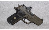 Sig Sauer~P229~9mm Luger