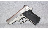 Smith & Wesson~Model 3913 Stainless~9mm Luger - 2 of 3