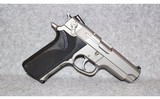Smith & Wesson~Model 4006 Stainless~.40 S&W - 1 of 2