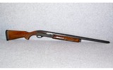 Remington~1100~12 Gauge - 1 of 7