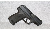 Heckler & Koch~USP Compact~.40 S&W - 1 of 3