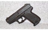 Heckler & Koch~USP Compact~.40 S&W - 2 of 3