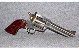 Ruger~New Model Super Blackhawk~.44 Magnum 5.5" Barrel - 1 of 3
