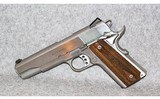 Springfield Armory~1911 Garrison Model~.45 Auto - 2 of 3