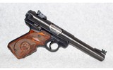 Ruger~MK IV~.22 Long Rifle - 1 of 2