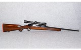 Ruger~M77~.243 Winchester Tang Safety Red Pad - 1 of 8