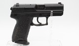 HK~USP Compact~.40 S&W - 1 of 4