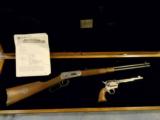 Winchester Wells Fargo rifle with Colt .45 cal Wells Fargo both engraved
- 3 of 4