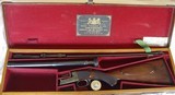 Daniel Fraser Scoped and Cased Rook 25-35 Winchester - 1 of 11