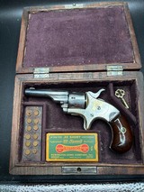 Antique Colt Open Top Model Single Action Pocket Revolver , 7 shot ,spur trigger,
in .22 short . Locking