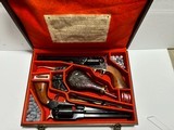 2 Vintage 1970's Black powder Uberti .44 cal revolvers, Unfired in custom case with accessories