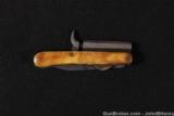 ONE-OF-A-KIND SINGLE BARREL PERCUSSION PISTOL WITH FOLDING KNIFE AND CAMPER’S TOOL - 1 of 6