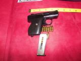 Lorcin, 25ACP two one w/white one w/black grips one mag each - 2 of 3