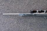 Ruger 77/22 Stainless w/ Skeleton Stock
- 5 of 8