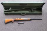 Remington 700 CDL NWTF Rifle in 270 WSM with Case - 1 of 8
