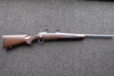 257 Roberts Remington 700 Stainless with Walnut stock
- 9 of 9