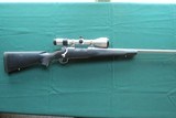 Winchester Model 70 Classic Stainless in 7mm Rem. Mag w/ Meopta Scope - 1 of 12