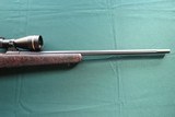 Cooper Firearms Model 52 Excalibur in 25-05 with Leupold VX-III Long Range Scope - 3 of 10