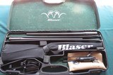 Blaser R8 w/6.5 Creedmoor & 270 Winchester barrels - 1 of 15