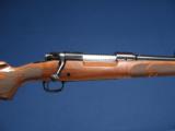 WINCHESTER 70 FEATHERWEIGHT 7MM MAUSER - 1 of 7