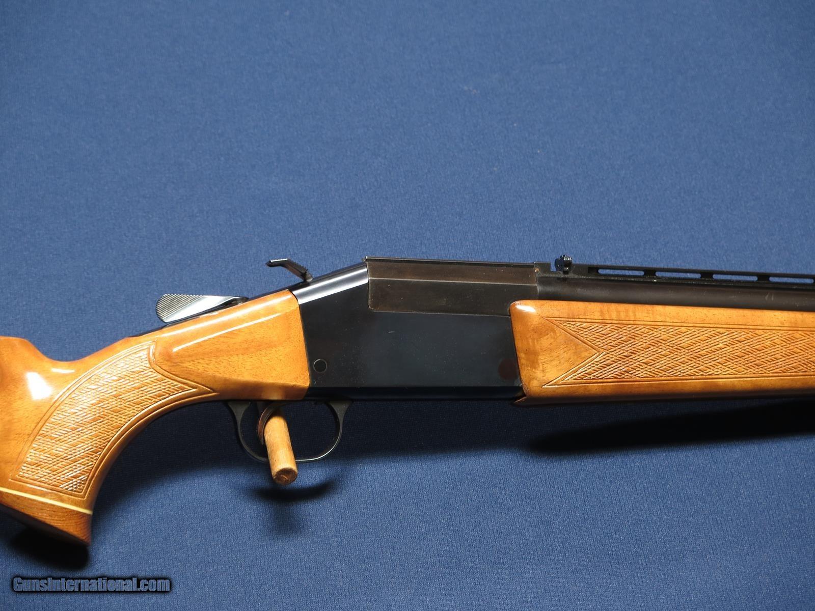 TIKKA OU 12 GAUGE  222 REM COMBINATION GUN