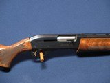 REMINGTON 1100 SPORTING 12 GAUGE - 1 of 7