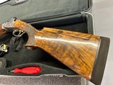 Perazzi MX 8 SC3 Sporter w/32barrels, choke tubes, extra trigger group and parts kit. Very attractive wood with adjustable comb.