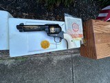 A pair of Colt John Wayne Commemorative Single Action Army revolvers in 45LC. As new, never cocked and with new factory display cases. - 3 of 8
