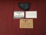 Browning early Baby 25 cal. Pouch and manual - 1 of 3